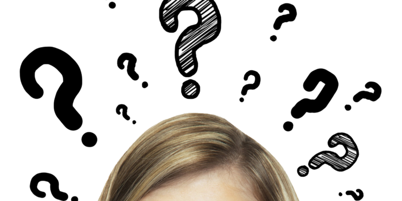 blond woman's half face with drawn question marks on top